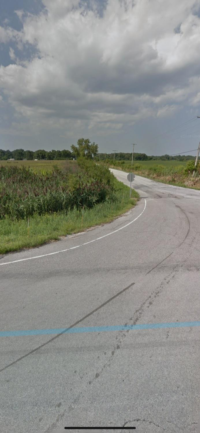 4898 East East State Road Demotte, IN 46310 - Photo 3 of 3 a view of a lake with a big yard