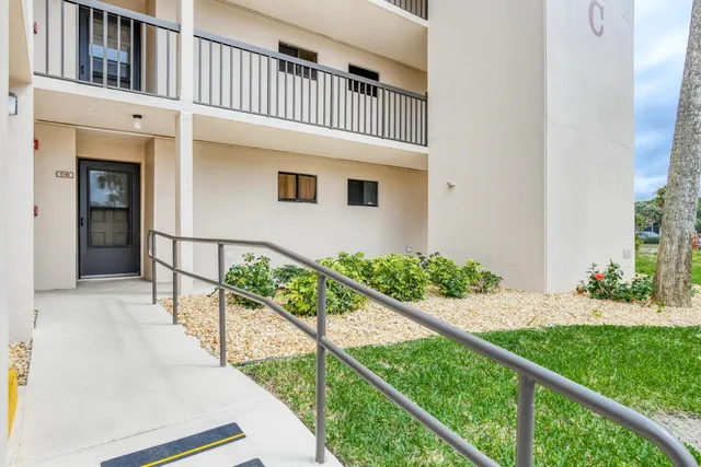 a bathroom with a shower and a sink