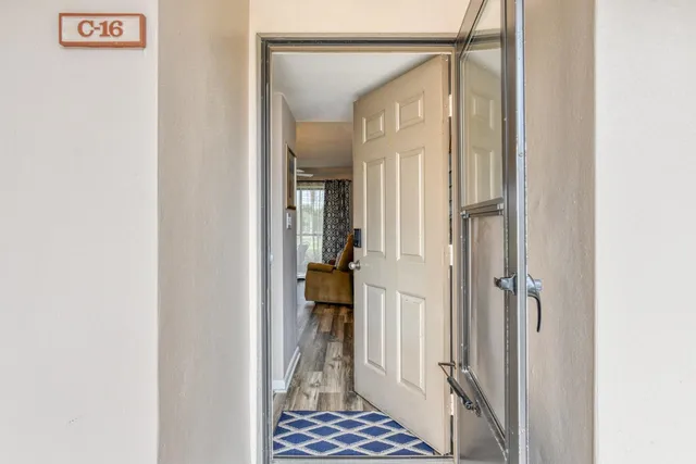 a kitchen with stainless steel appliances granite countertop a stove a refrigerator and a sink