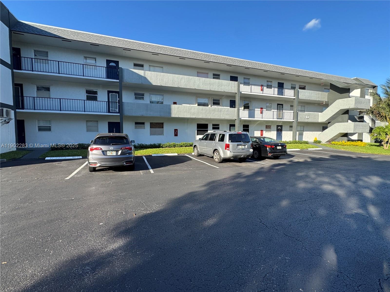 8330 Sands Point Boulevard, Unit N208 Tamarac, FL 33321 - Photo 26 of 35 a view of parking