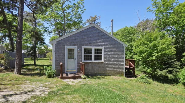 front view of a house with a yard