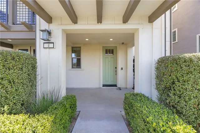 a lobby with furniture and garden view