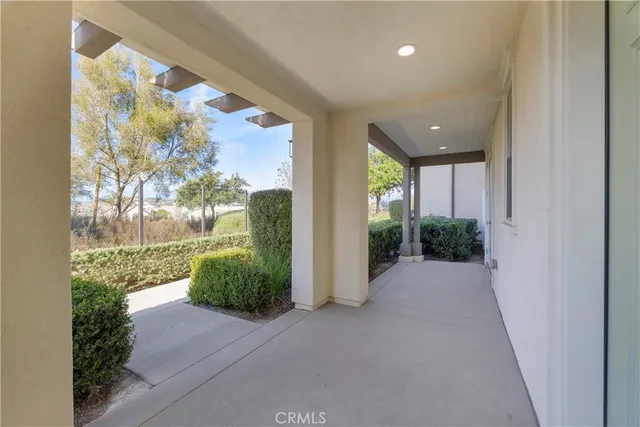 a view of hallway with wooden floor
