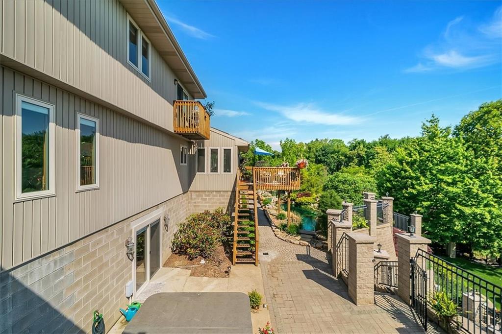 2106 Reis Run Road Pittsburgh, PA 15237 - Photo 19 of 42 a view of a house with wooden stairs