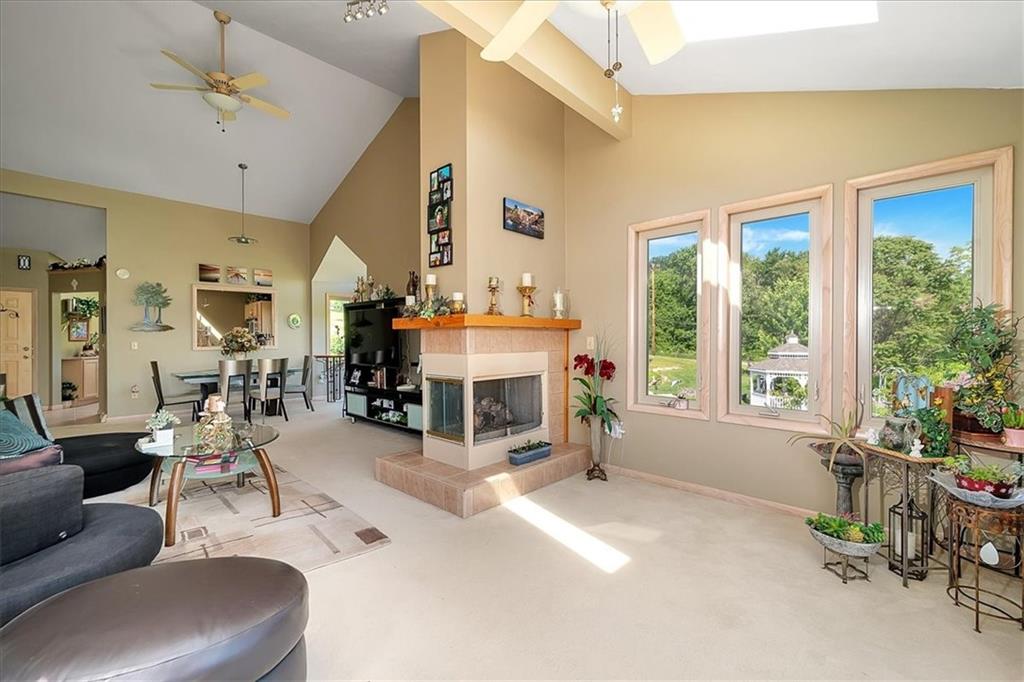 2106 Reis Run Road Pittsburgh, PA 15237 - Photo 20 of 42 a living room with furniture large window and flat screen tv