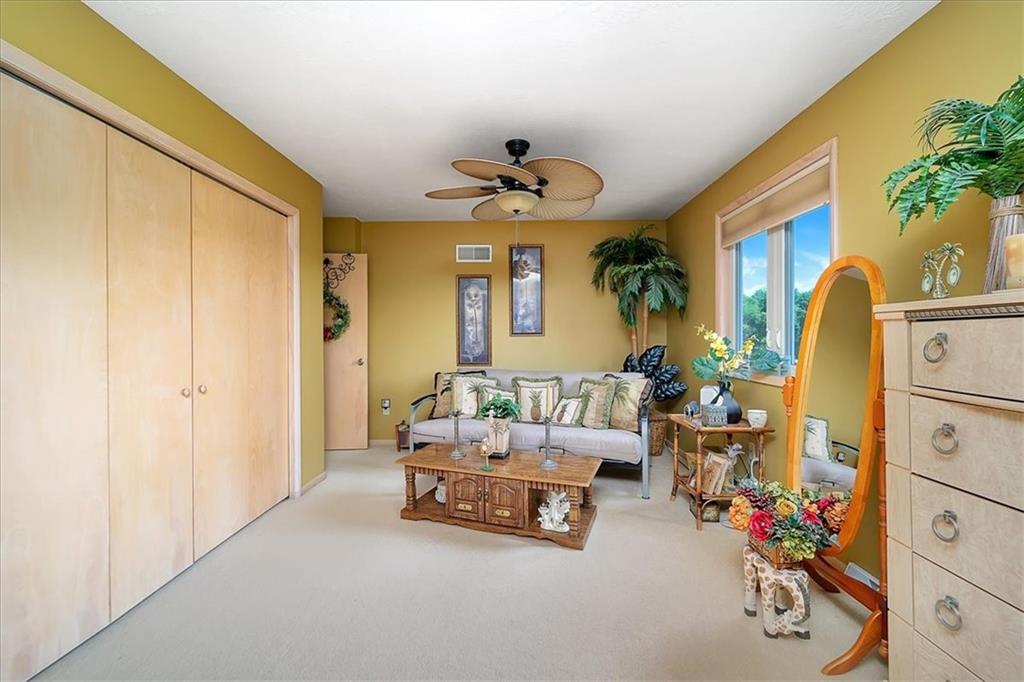 2106 Reis Run Road Pittsburgh, PA 15237 - Photo 34 of 42 a living room with furniture and a chandelier