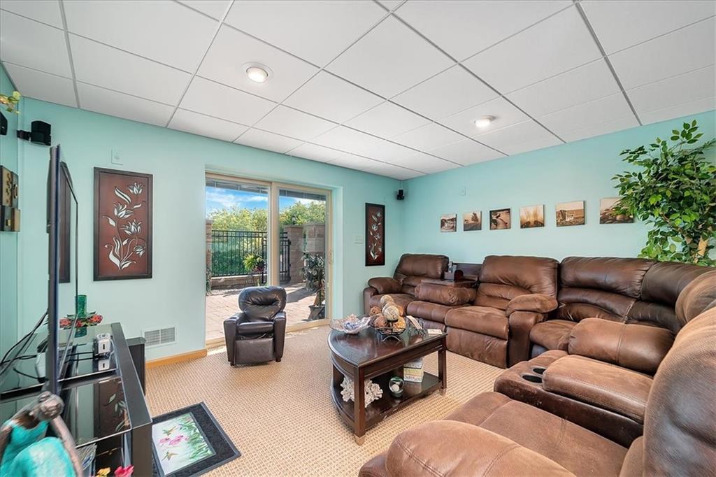 2106 Reis Run Road Pittsburgh, PA 15237 - Photo 40 of 42 a living room with furniture and a large window