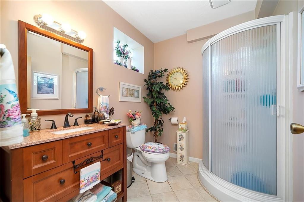 2106 Reis Run Road Pittsburgh, PA 15237 - Photo 41 of 42 a bathroom with a sink a toilet and shower