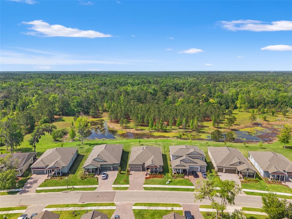 4661 Southern Valley Loop Brooksville, FL 34601 - Photo 2 of 62 a view of a swimming pool and an outdoor space