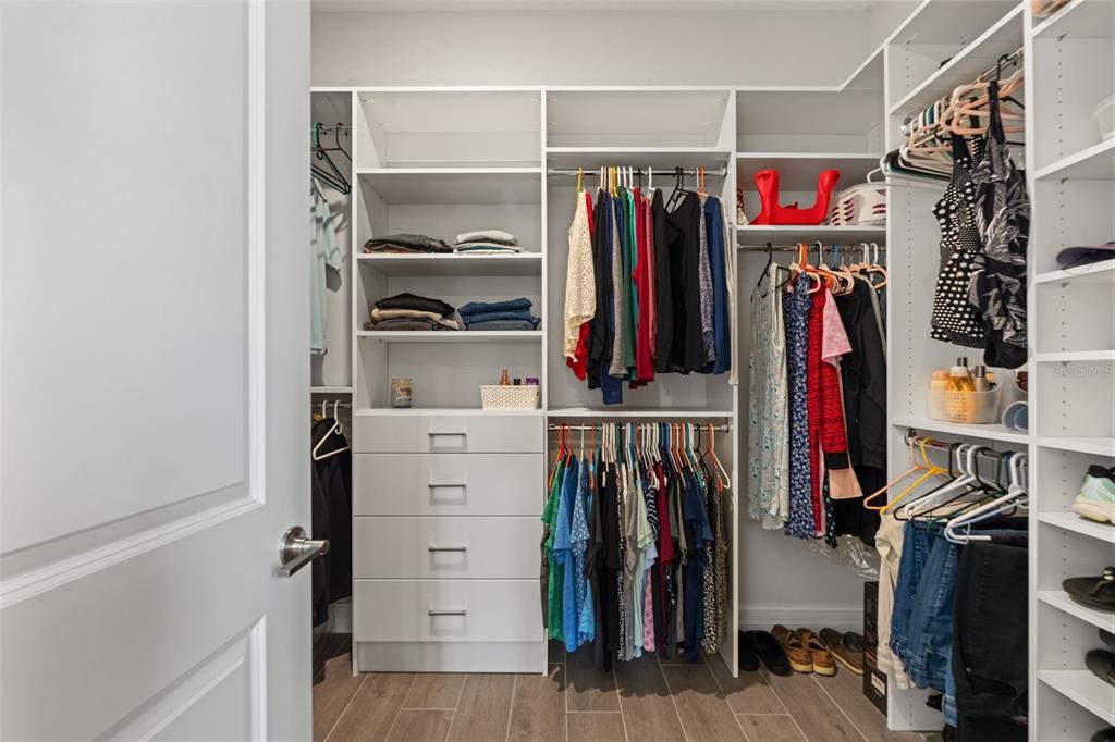 4661 Southern Valley Loop Brooksville, FL 34601 - Photo 23 of 62 a view of walk in closet with clothes