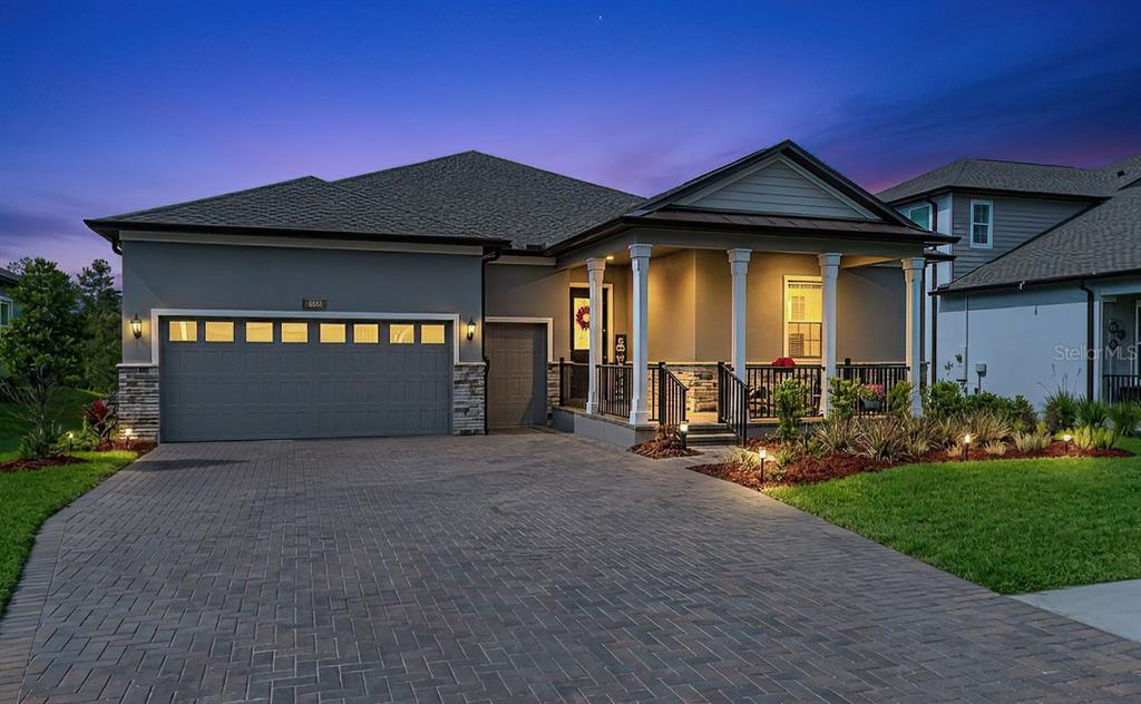 4661 Southern Valley Loop Brooksville, FL 34601 - Photo 4 of 62 a front view of a house with garden