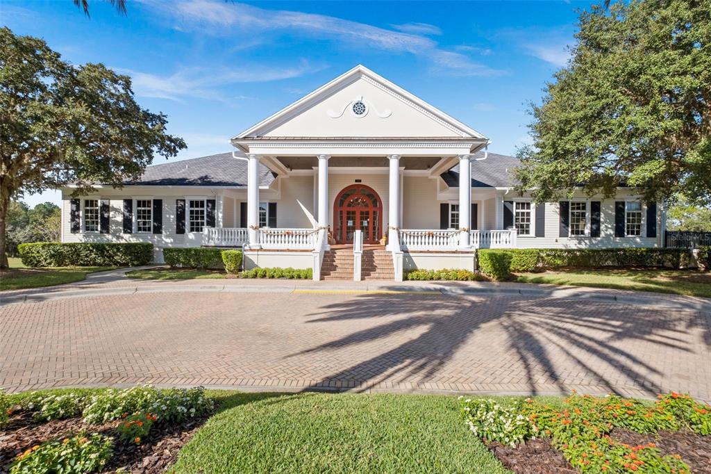 4661 Southern Valley Loop Brooksville, FL 34601 - Photo 56 of 62 a front view of a house with a yard