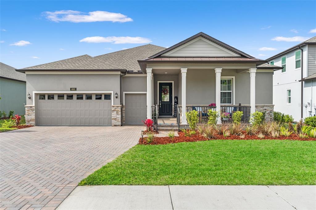 4661 Southern Valley Loop Brooksville, FL 34601 - Photo 62 of 62 a front view of a house with a yard and garage