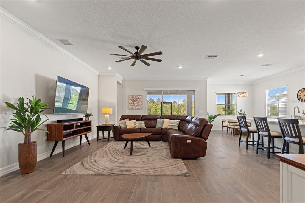 4661 Southern Valley Loop Brooksville, FL 34601 - Photo 7 of 62 a living room with furniture and wooden floor