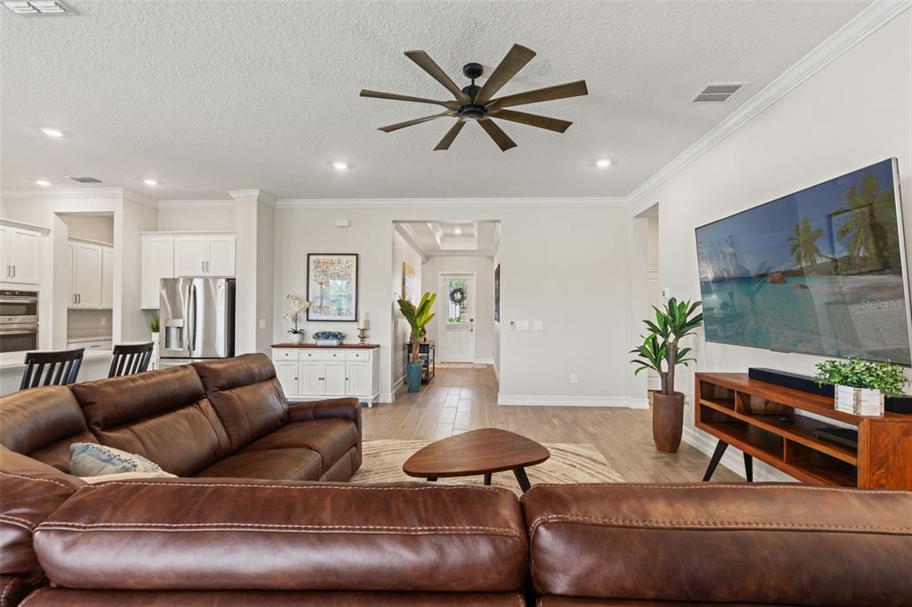 4661 Southern Valley Loop Brooksville, FL 34601 - Photo 10 of 62 a living room with furniture and a wooden floor