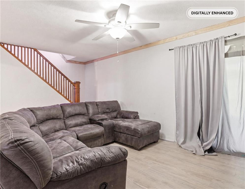 132 Waterloo Street Friedens, PA 15541 - Photo 12 of 47 a living room with furniture and a ceiling fan