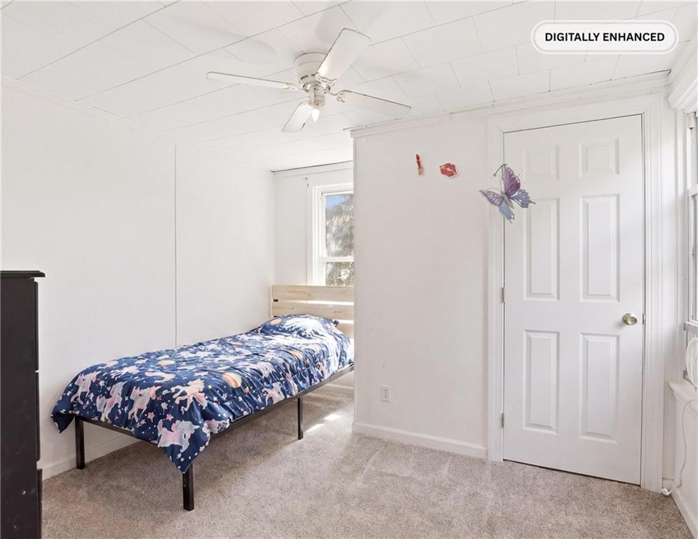 132 Waterloo Street Friedens, PA 15541 - Photo 15 of 47 a bedroom with bed and a chandelier