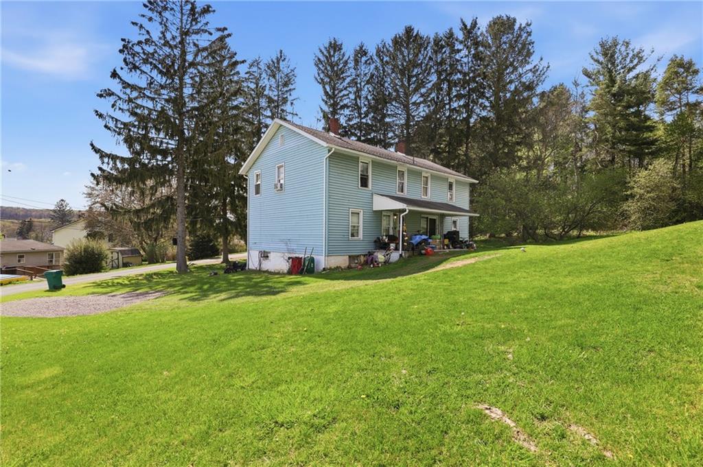 132 Waterloo Street Friedens, PA 15541 - Photo 2 of 47 a view of a yard with a house and garden