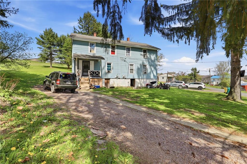 132 Waterloo Street Friedens, PA 15541 - Photo 4 of 47 a view of a house with a back yard