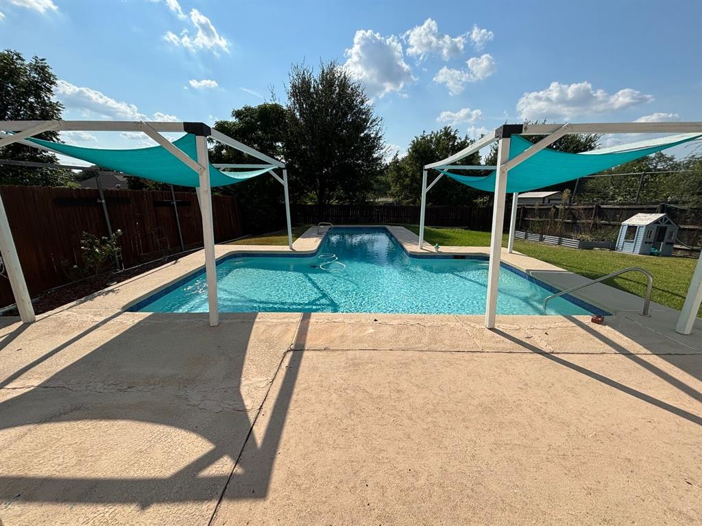 2113 Via Del Norte Carrollton, TX 75006 - Photo 21 of 24 a view of a backyard