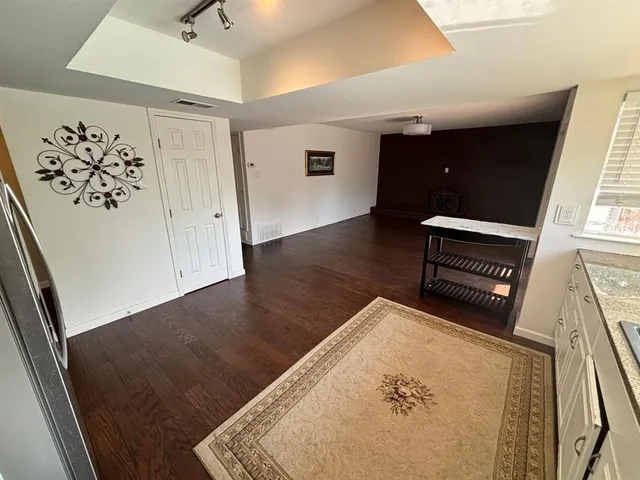 view of a living room with wooden floor