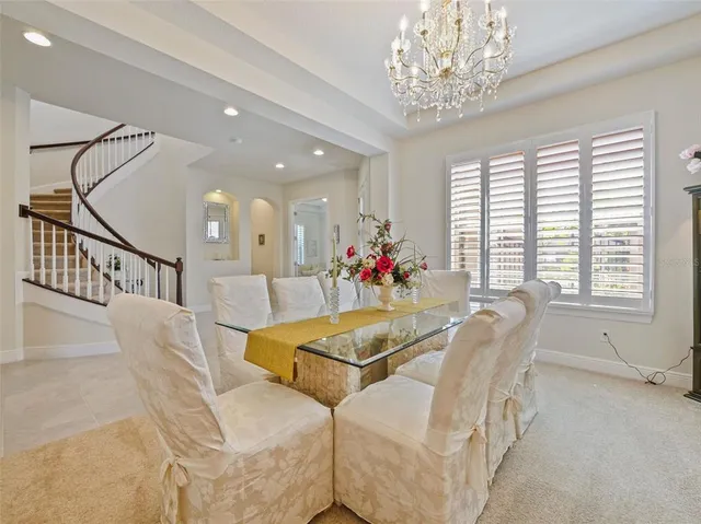 a kitchen with stainless steel appliances a refrigerator sink and stove