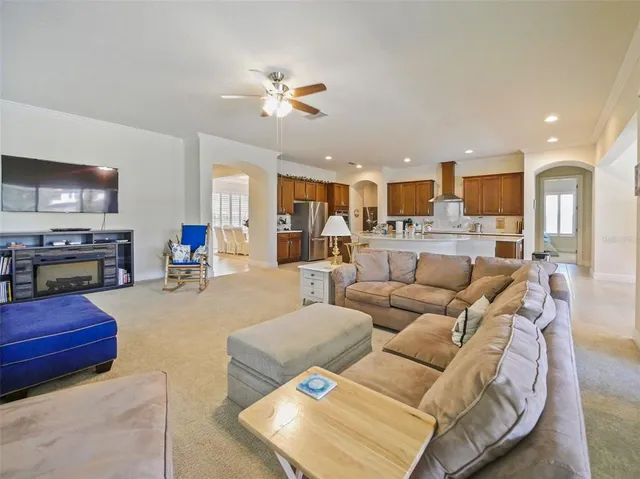 a large bathroom with a large tub shower and double vanity