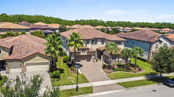 an aerial view of a house with a garden