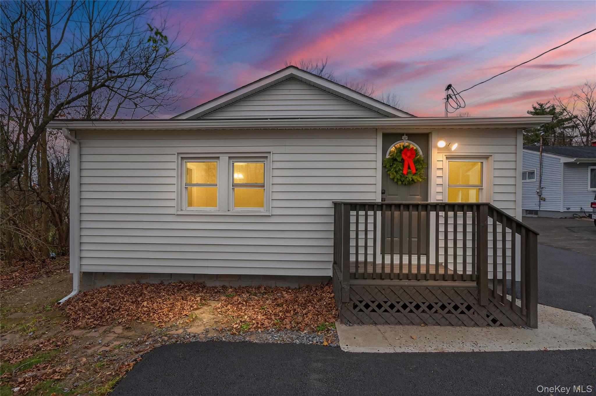 a front view of a house with a garage