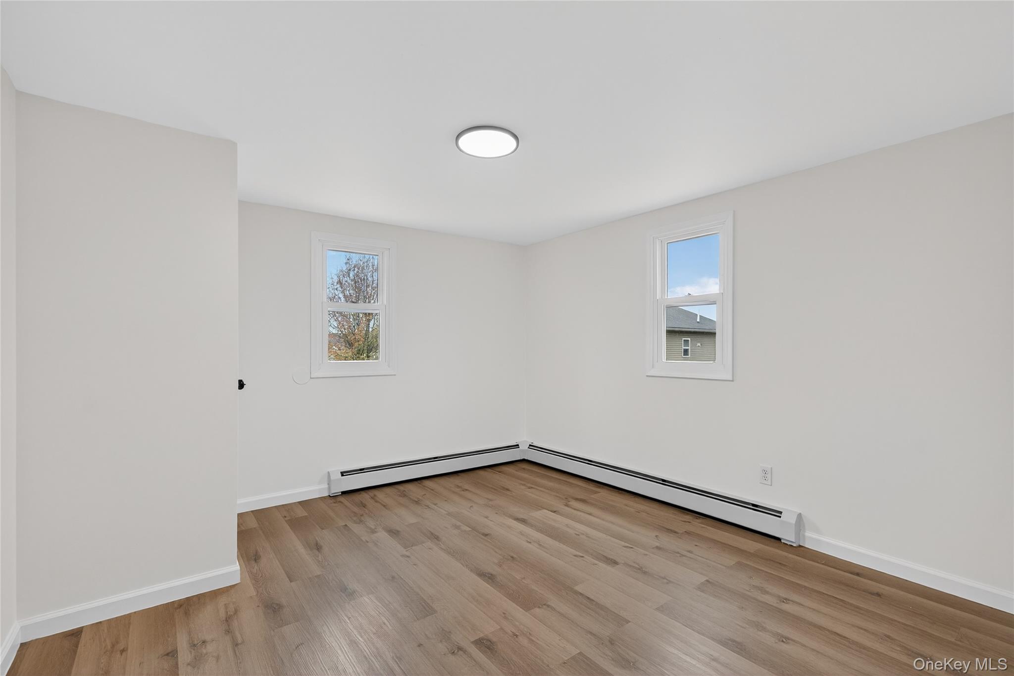 193 Schutt Road Middletown, NY 10940 - Photo 15 of 20 an empty room with a workbench