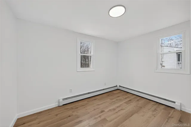 an empty room with a workspace