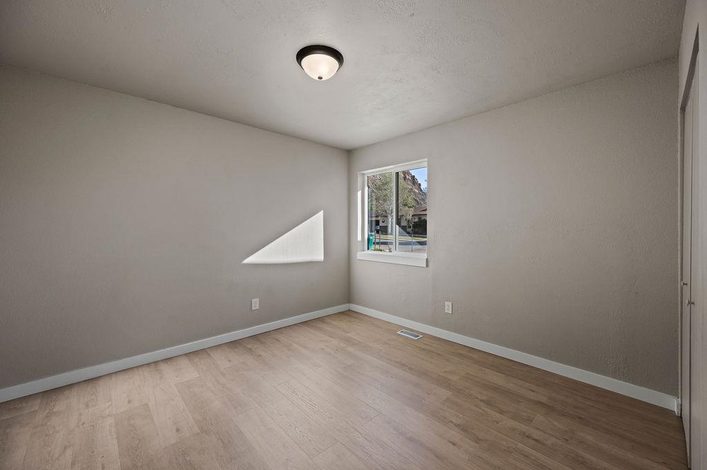 508 Rosa Street Palisade, CO 81526 - Photo 9 of 18 an empty room with windows and closet