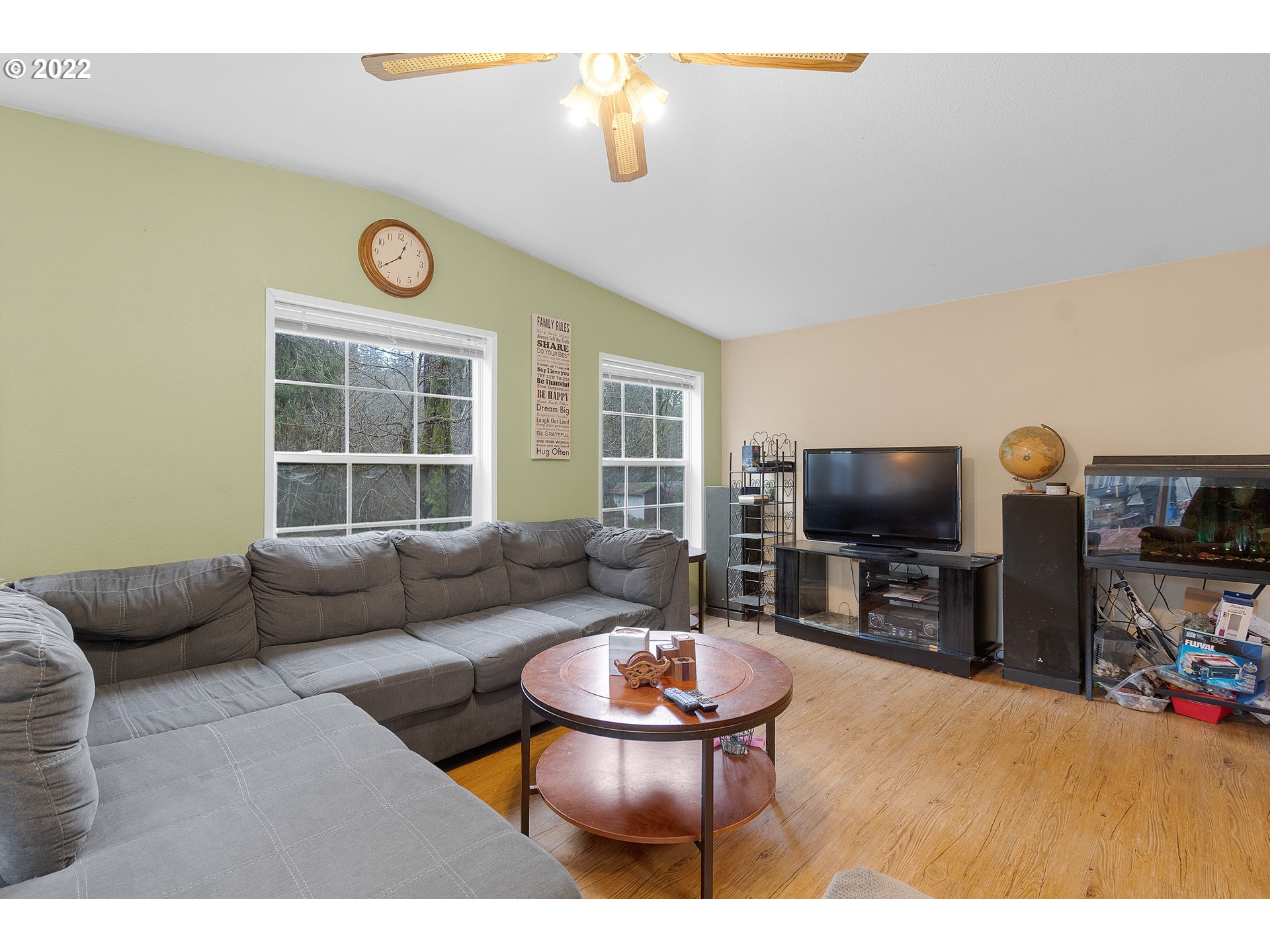 121 Brentwood Road Longview, WA 98632 - Photo 15 of 32 a living room with furniture and a flat screen tv