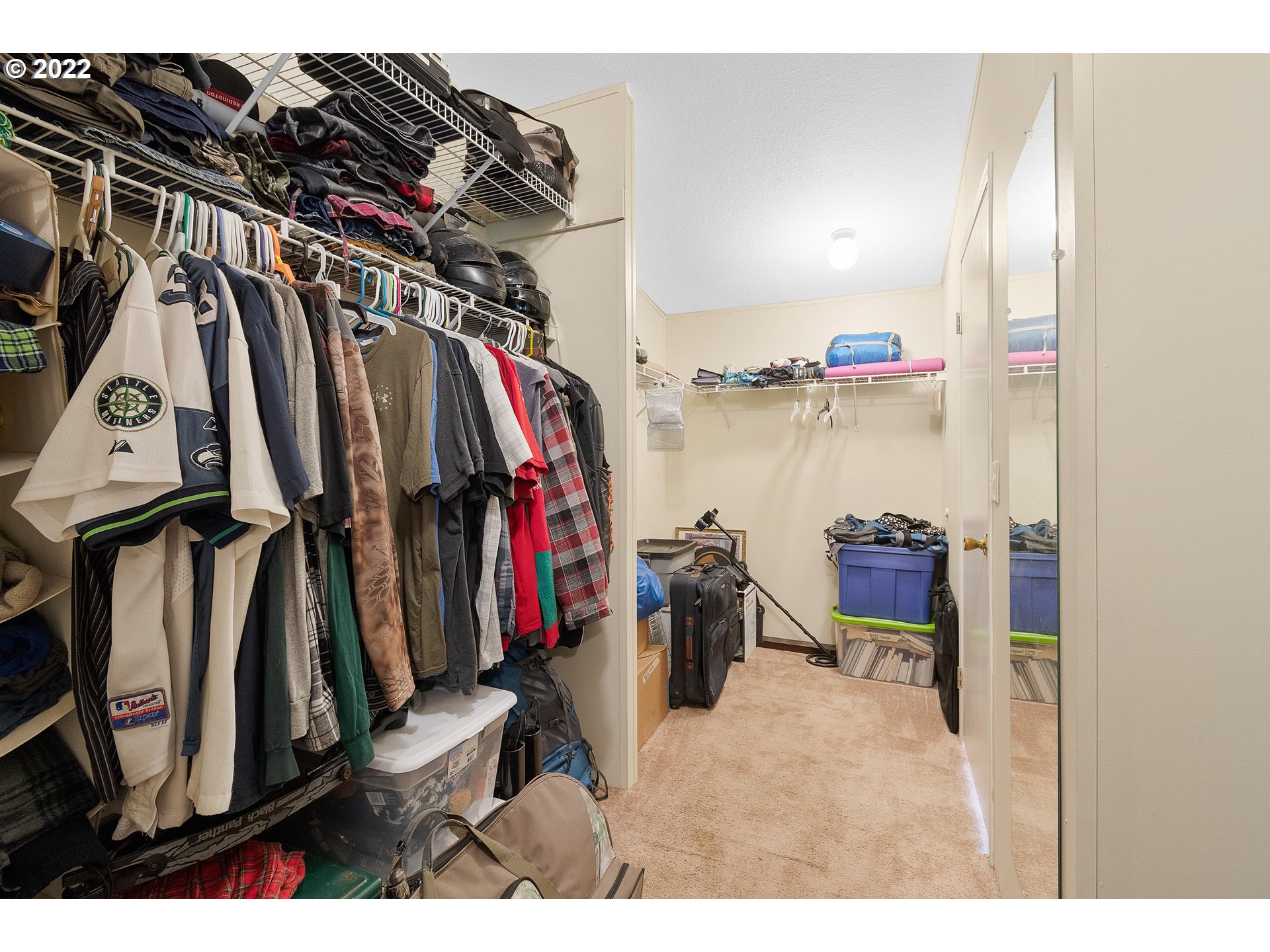 121 Brentwood Road Longview, WA 98632 - Photo 28 of 32 a view of walk in closet with clothes and shoes