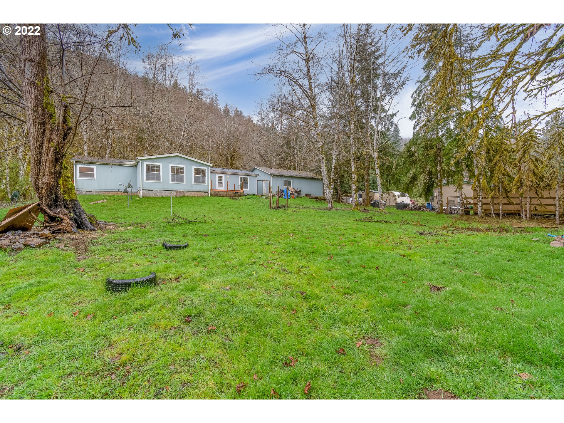 121 Brentwood Road Longview, WA 98632 - Photo 30 of 32 a view of a house with a backyard