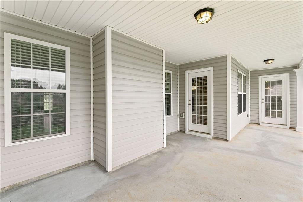 241 Red Bud Road Jefferson, GA 30549 - Photo 40 of 43 a view of a house with a large window