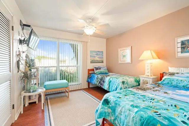 a bedroom with a bed and a couch