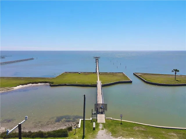 a small pool with a table and chairs