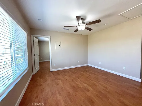 a bathroom with a double vanity sink mirror and toilet