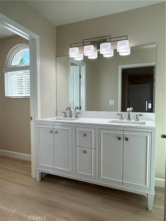a kitchen with stainless steel appliances granite countertop a refrigerator and a stove