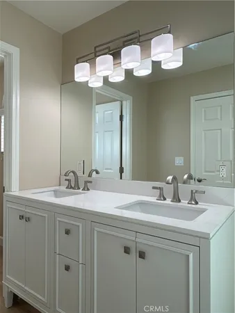 a kitchen with stainless steel appliances a stove and a refrigerator