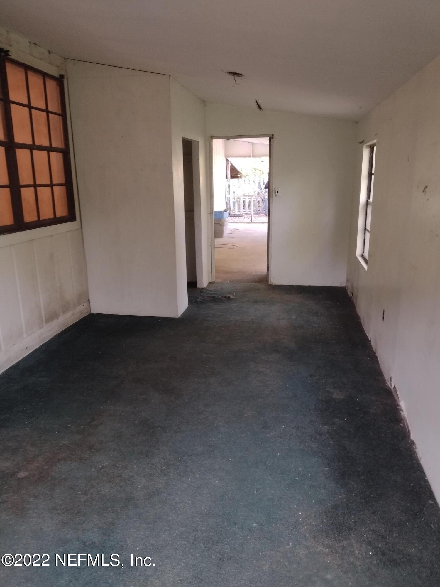 54065 Plantation Road Callahan, FL 32011 - Photo 10 of 16 Enclosed Porch