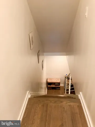 a view of a room with stairs and a couch