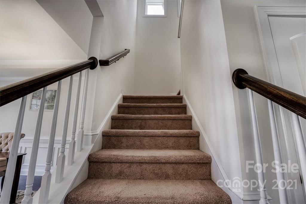 4008 Fallondale Road Waxhaw, NC 28173 - Photo 19 of 44 a view of staircase with white walls