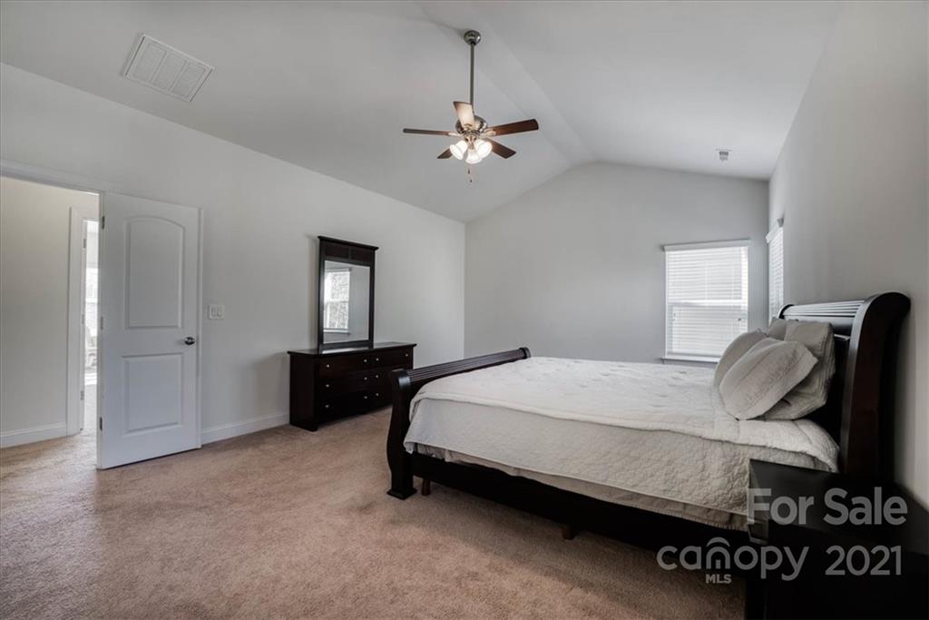4008 Fallondale Road Waxhaw, NC 28173 - Photo 26 of 44 a bedroom with bed and window