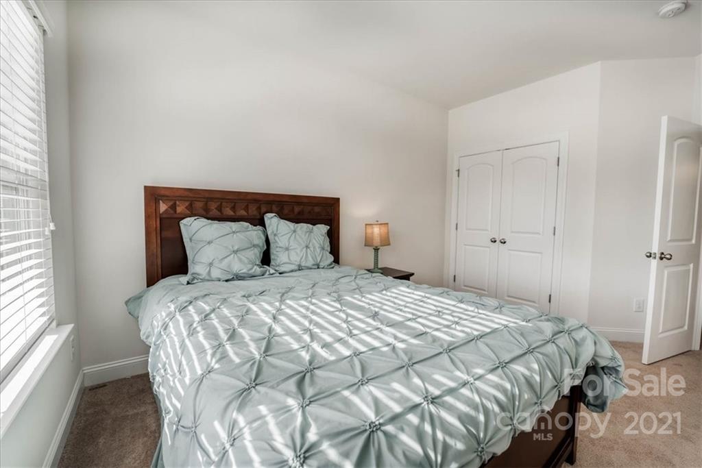 4008 Fallondale Road Waxhaw, NC 28173 - Photo 35 of 44 a bedroom with a bed and a window