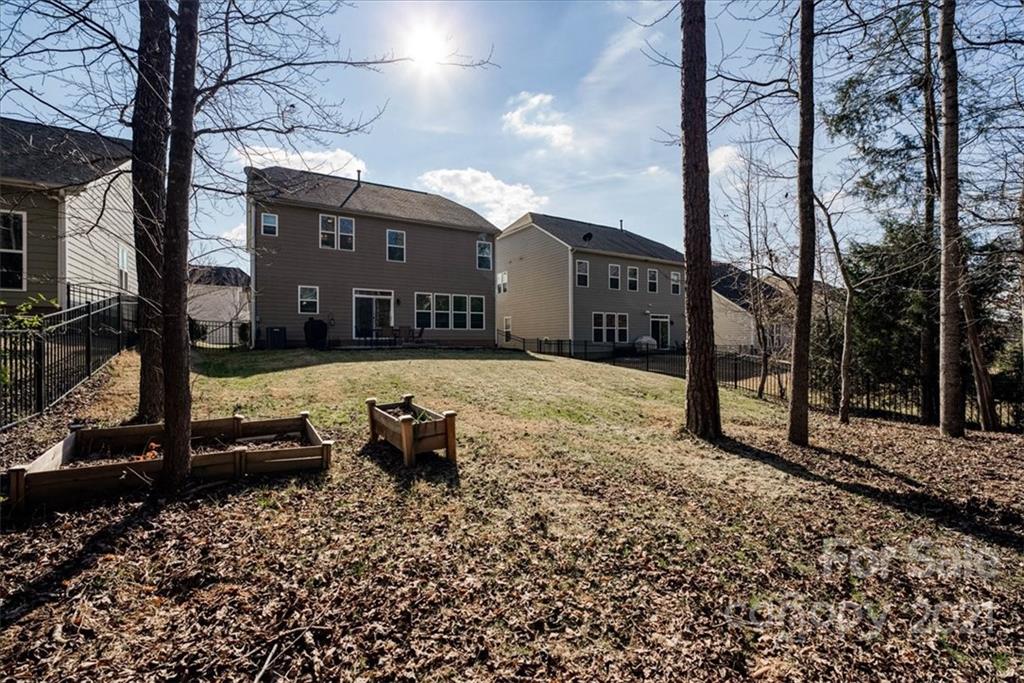 4008 Fallondale Road Waxhaw, NC 28173 - Photo 39 of 44 a view of a street with a building in the background