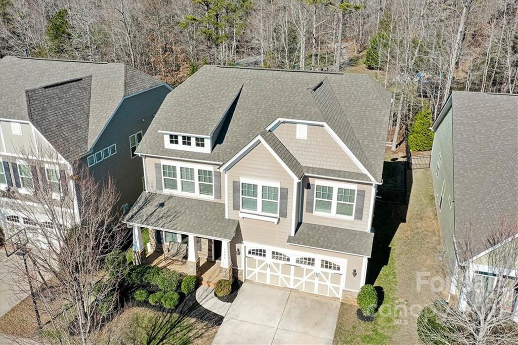 4008 Fallondale Road Waxhaw, NC 28173 - Photo 5 of 44 a aerial view of a house with a yard and potted plants
