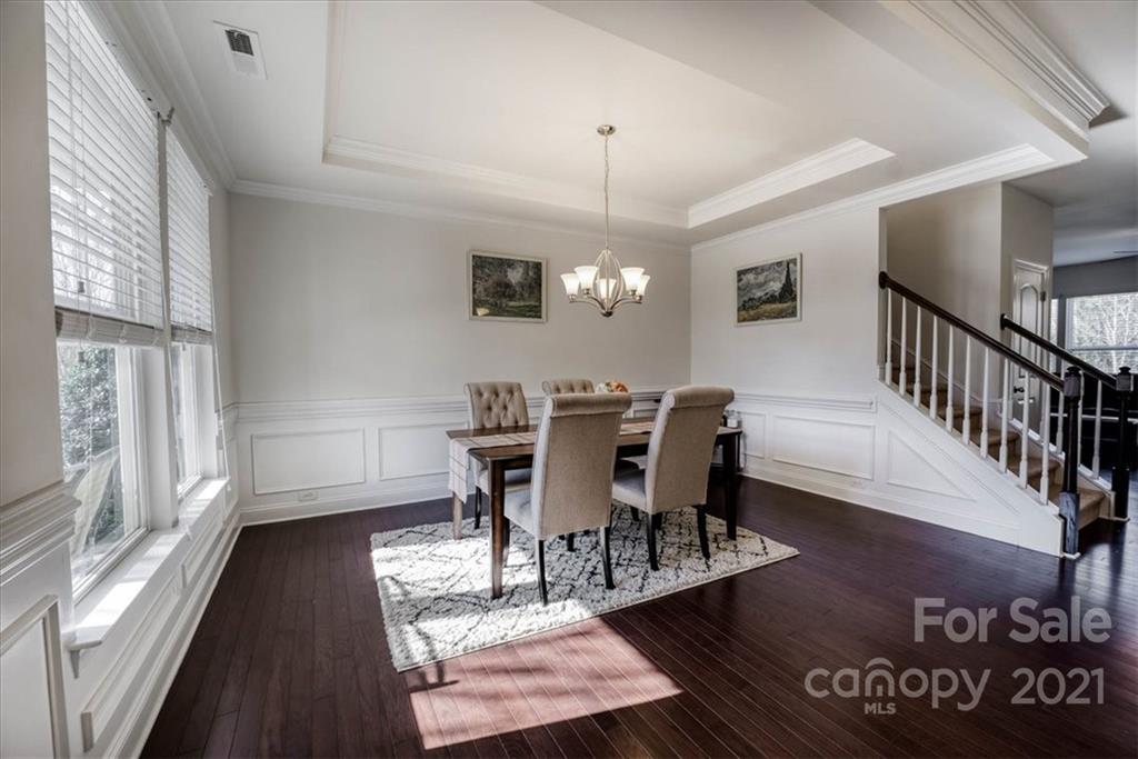 4008 Fallondale Road Waxhaw, NC 28173 - Photo 6 of 44 a view of a dining room with furniture window and wooden floor