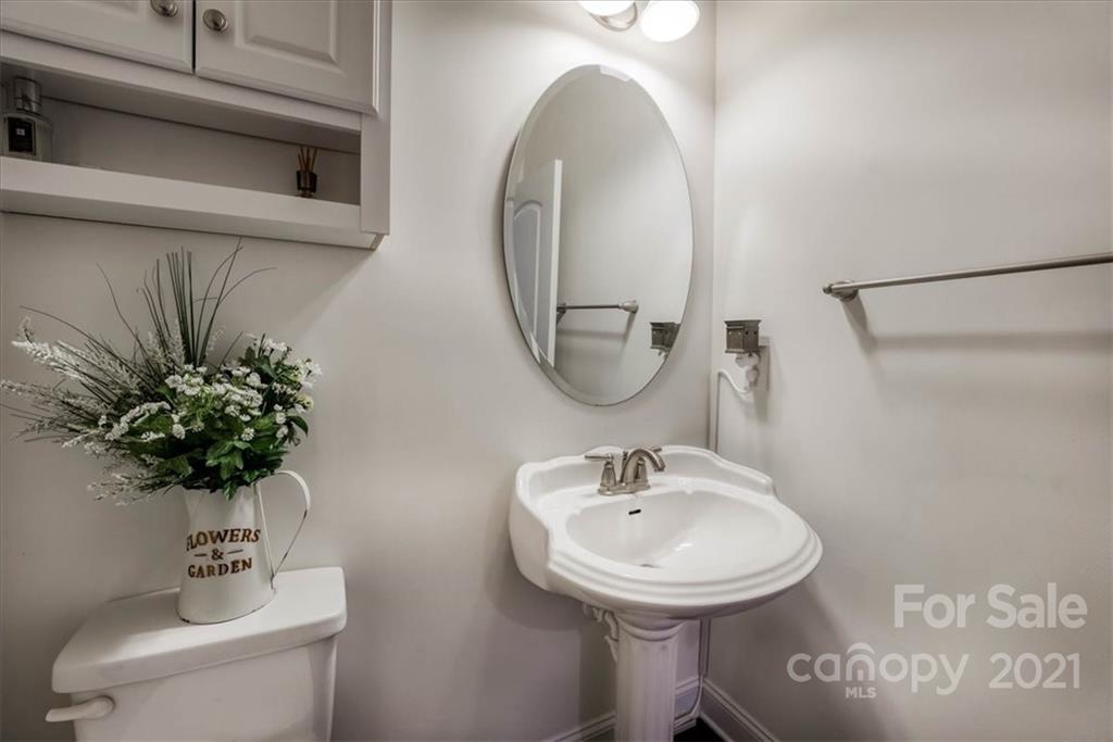 4008 Fallondale Road Waxhaw, NC 28173 - Photo 9 of 44 a bathroom with a sink toilet and a mirror